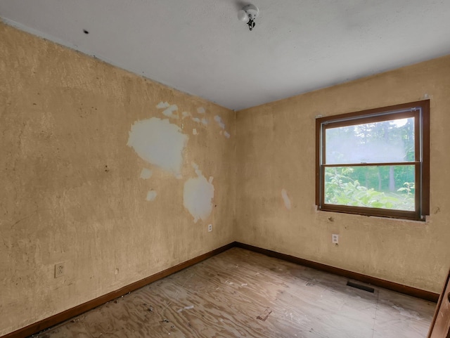 15828 Hedges Rd, Laurelville, OH 43135 - empty room featuring baseboards and wood finished floors