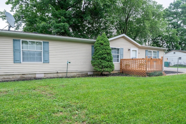 160 Cliff St, Buckeye Lake, OH 43008 - rear view of house with a lawn and a deck