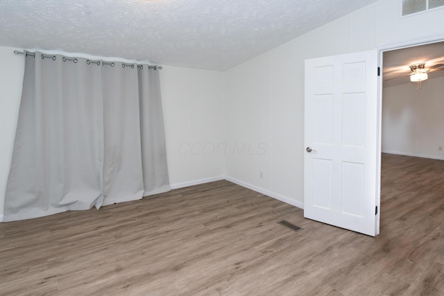 160 Cliff St, Buckeye Lake, OH 43008 - unfurnished room with a textured ceiling and wood finished floors
