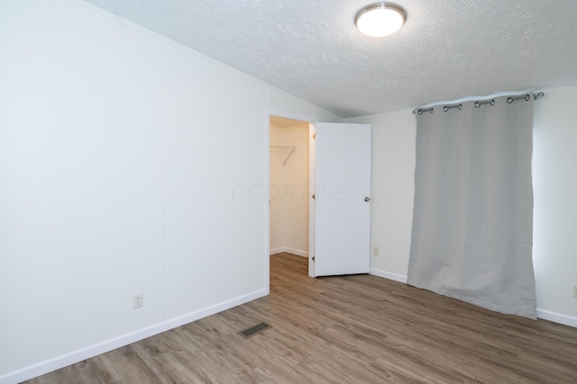 160 Cliff St, Buckeye Lake, OH 43008 - unfurnished room with a textured ceiling and wood finished floors