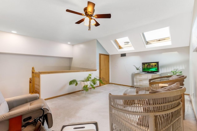 7179 Inverness Ct, Dublin, OH 43016 - sitting room with a skylight, carpet flooring, baseboards, a ceiling fan, and vaulted ceiling