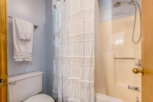 7179 Inverness Ct, Dublin, OH 43016 - bathroom with toilet and shower / bathtub combination with curtain
