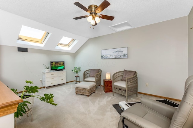 7179 Inverness Ct, Dublin, OH 43016 - sitting room featuring a skylight, lofted ceiling, carpet flooring, baseboards, and attic access