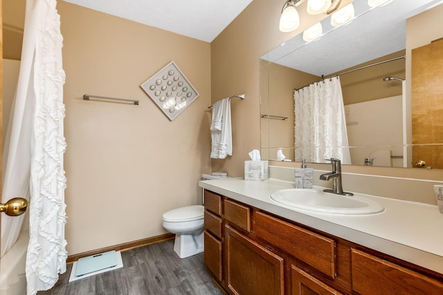 7179 Inverness Ct, Dublin, OH 43016 - full bath featuring toilet, wood finished floors, vanity, and a shower with shower curtain