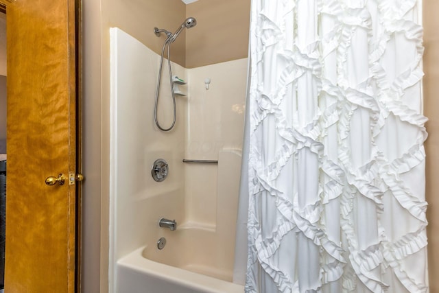 7179 Inverness Ct, Dublin, OH 43016 - bathroom with shower / bathtub combination with curtain
