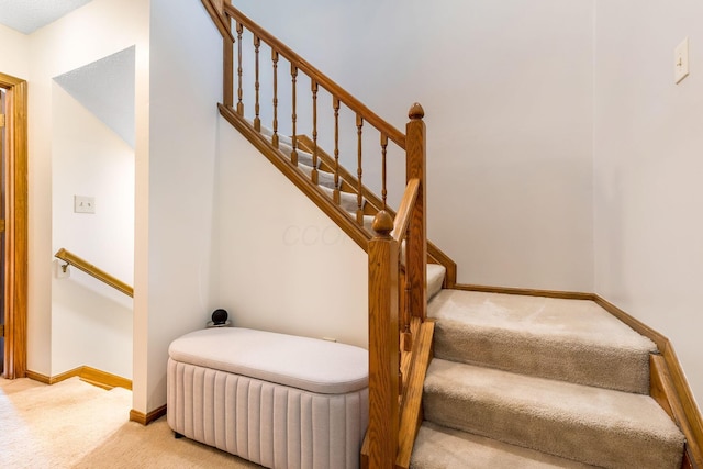 7179 Inverness Ct, Dublin, OH 43016 - staircase featuring carpet and baseboards