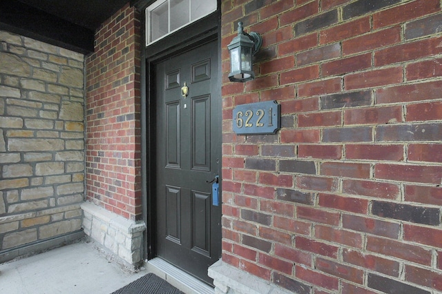6221 Craughwell Ln, Dublin, OH 43017 - doorway to property with brick siding