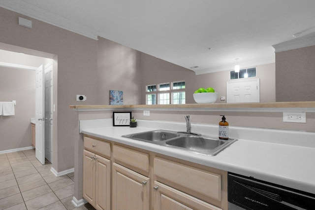 6221 Craughwell Ln, Dublin, OH 43017 - kitchen with a sink, dishwasher, light countertops, light tile patterned floors, and baseboards