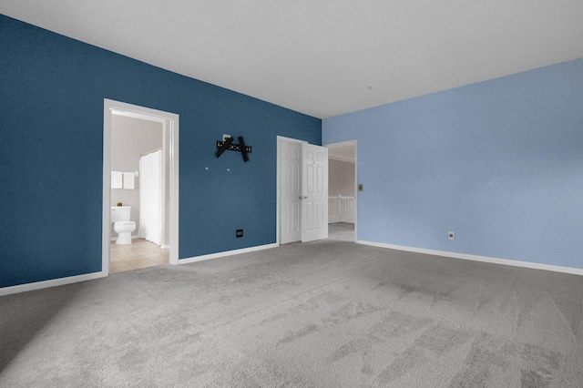6221 Craughwell Ln, Dublin, OH 43017 - unfurnished bedroom with carpet, baseboards, and connected bathroom