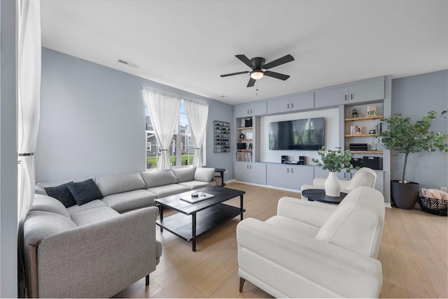 3834 Brody Dr, Grove City, OH 43123 - living room with ceiling fan, light wood-type flooring, and built in shelves