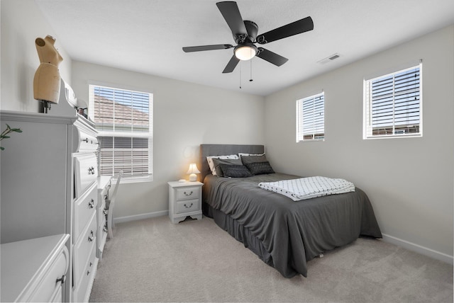 3834 Brody Dr, Grove City, OH 43123 - bedroom with baseboards, multiple windows, light carpet, and a ceiling fan