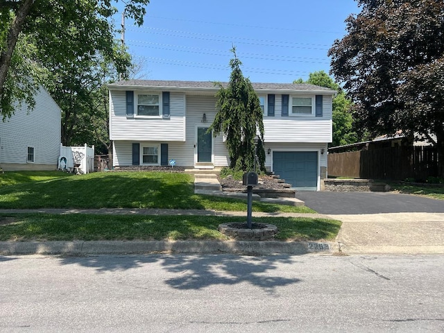 2253 Topaz Dr, Grove City, OH 43123 - raised ranch with a garage and asphalt driveway