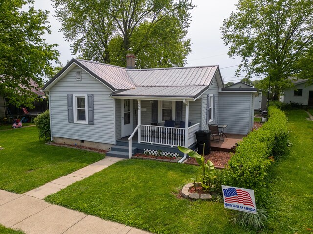 408 Olive St, Greenfield, OH 45123 - view of front of home with a porch, metal roof, a front lawn, and crawl space