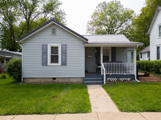 408 Olive St, Greenfield, OH 45123 - bungalow-style house with a porch, a front yard, and metal roof