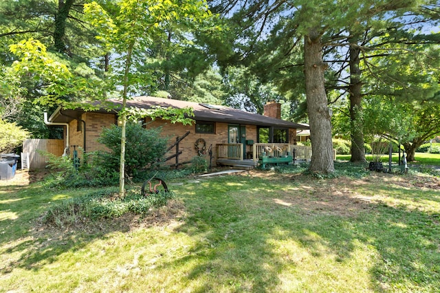 166 Flint Ridge Dr, Gahanna, OH 43230 - view of front facade featuring a chimney, brick siding, a front yard, and a deck