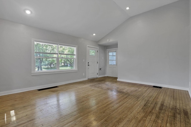 960 College Ave, Columbus, OH 43209 - entryway with lofted ceiling, hardwood / wood-style floors, baseboards, and recessed lighting