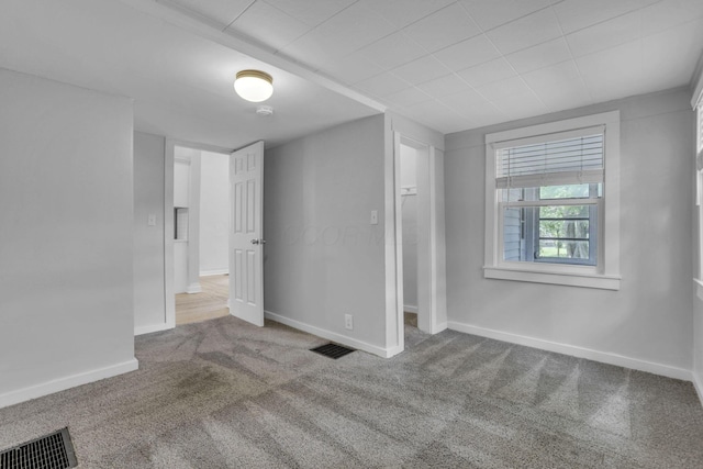 960 College Ave, Columbus, OH 43209 - unfurnished bedroom featuring carpet and baseboards