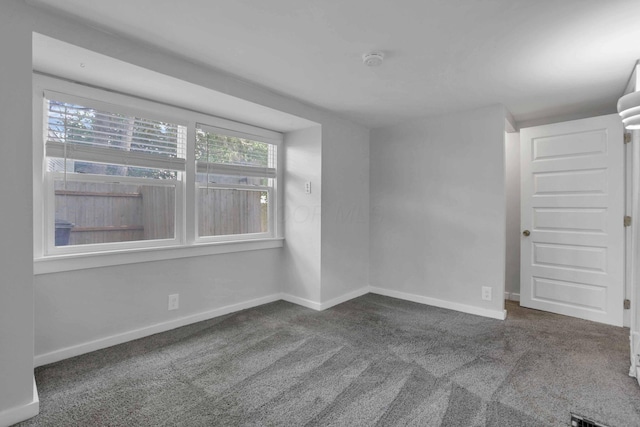 960 College Ave, Columbus, OH 43209 - spare room with carpet floors, a smoke detector, and baseboards
