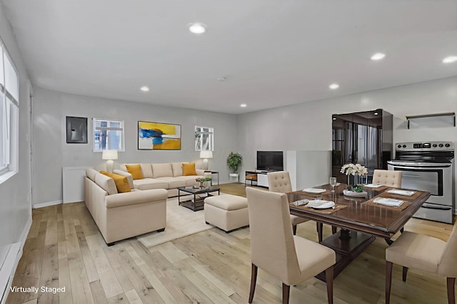 960 College Ave, Columbus, OH 43209 - living room featuring light wood finished floors, recessed lighting, and baseboards
