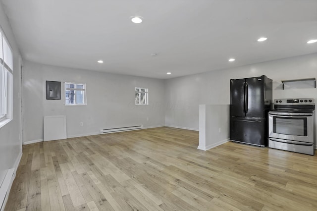 960 College Ave, Columbus, OH 43209 - unfurnished living room featuring a baseboard heating unit, light wood-style floors, electric panel, baseboards, and recessed lighting