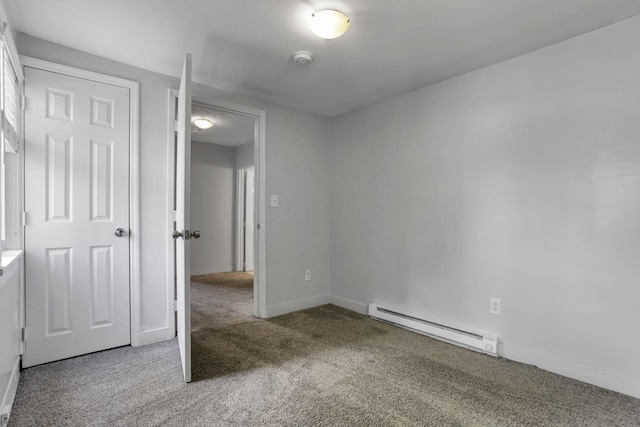 960 College Ave, Columbus, OH 43209 - empty room featuring a baseboard radiator, carpet floors, and baseboards