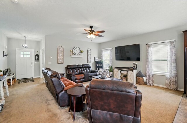 459 Wingate Pl, Mount Sterling, OH 43143 - living area with light carpet, baseboards, and a ceiling fan