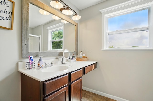 459 Wingate Pl, Mount Sterling, OH 43143 - full bathroom featuring vanity, baseboards, and a shower with door