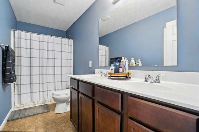 459 Wingate Pl, Mount Sterling, OH 43143 - full bath with toilet, double vanity, a shower with shower curtain, a textured ceiling, and baseboards