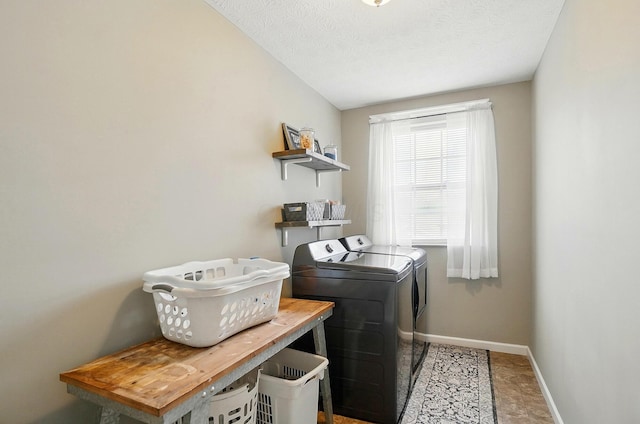 459 Wingate Pl, Mount Sterling, OH 43143 - washroom with washer and clothes dryer, baseboards, and a textured ceiling