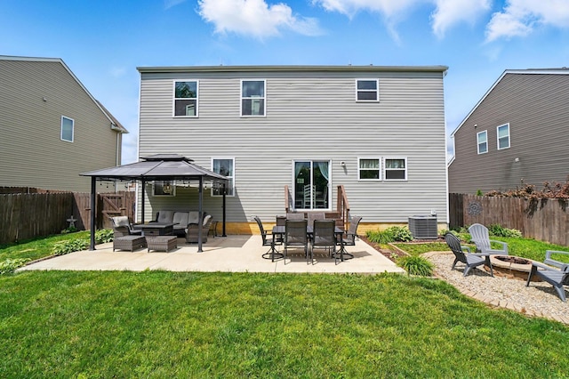 459 Wingate Pl, Mount Sterling, OH 43143 - back of house featuring an outdoor living space with a fire pit, a gazebo, a patio area, and cooling unit