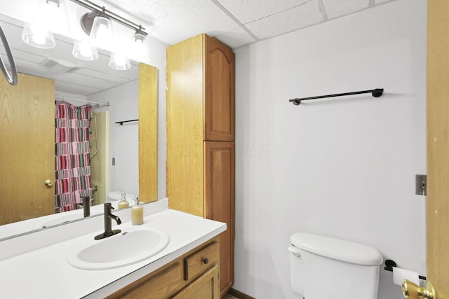3939 Karl Rd Unit 206, Columbus, OH 43224 - full bathroom featuring vanity, toilet, and curtained shower