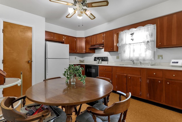 3723 Klibreck Dr, Columbus, OH 43228 - kitchen featuring freestanding refrigerator, range with electric stovetop, under cabinet range hood, a sink, and ceiling fan