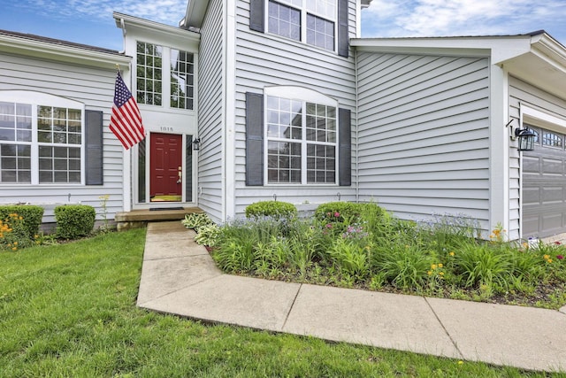 1015 Harborton Dr, Columbus, OH 43228 - property entrance featuring a garage and a yard