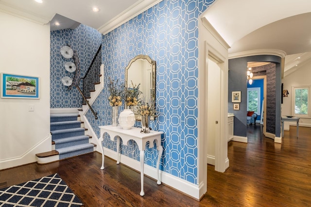 14 Lyonsgate Rd, Bexley, OH 43209 - entrance foyer featuring wallpapered walls, baseboards, arched walkways, wood finished floors, and stairs