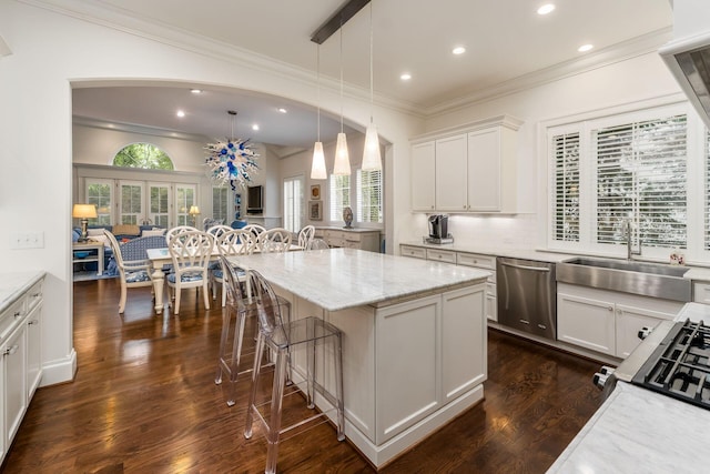 14 Lyonsgate Rd, Bexley, OH 43209 - kitchen with stainless steel dishwasher, a sink, arched walkways, recessed lighting, and dark wood-type flooring