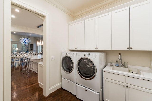 14 Lyonsgate Rd, Bexley, OH 43209 - washroom featuring washing machine and clothes dryer, crown molding, cabinet space, dark wood-style floors, and recessed lighting