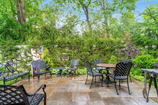 14 Lyonsgate Rd, Bexley, OH 43209 - view of patio / terrace with outdoor dining space and view of scattered trees