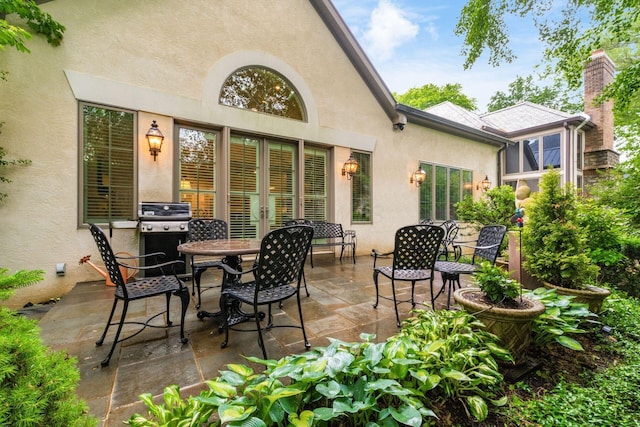 14 Lyonsgate Rd, Bexley, OH 43209 - view of patio / terrace with a grill and french doors