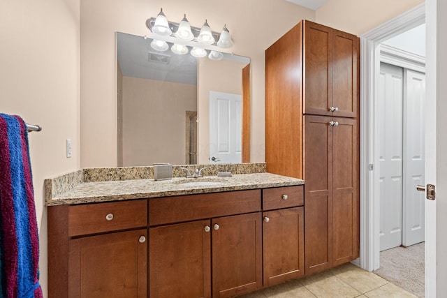 925 Ingleside Ave Unit 213, Columbus, OH 43215 - bathroom featuring vanity and tile patterned flooring