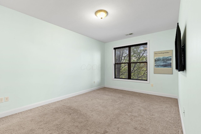925 Ingleside Ave Unit 213, Columbus, OH 43215 - unfurnished room featuring carpet and baseboards