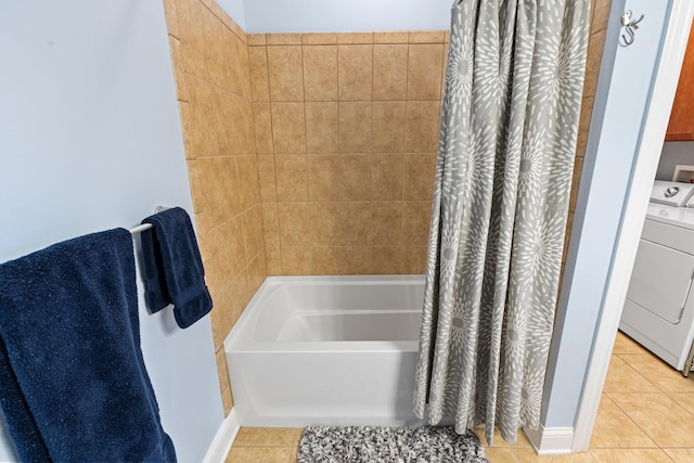 925 Ingleside Ave Unit 213, Columbus, OH 43215 - full bathroom featuring washer / clothes dryer, tile patterned flooring, and shower / bath combo