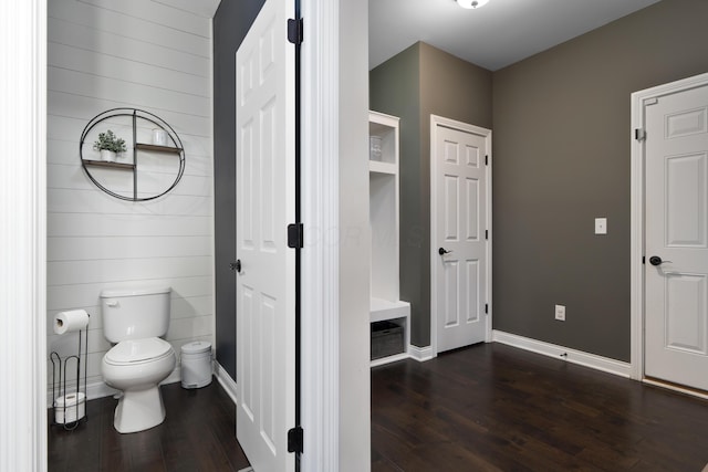 3669 Audubon Ave, Hilliard, OH 43026 - bathroom featuring toilet, wood finished floors, baseboards, and wood walls