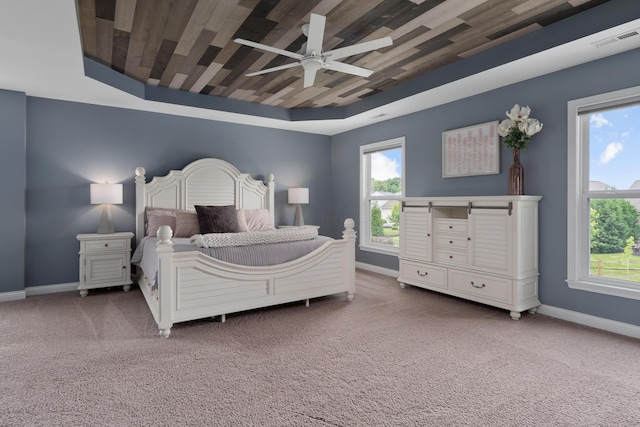 3669 Audubon Ave, Hilliard, OH 43026 - bedroom with baseboards, carpet floors, a raised ceiling, wooden ceiling, and ceiling fan