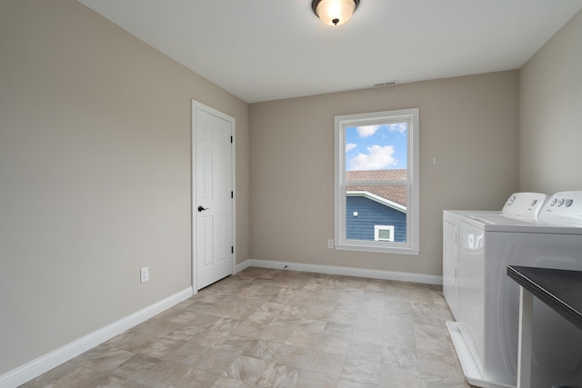 3669 Audubon Ave, Hilliard, OH 43026 - washroom featuring washer and clothes dryer and baseboards