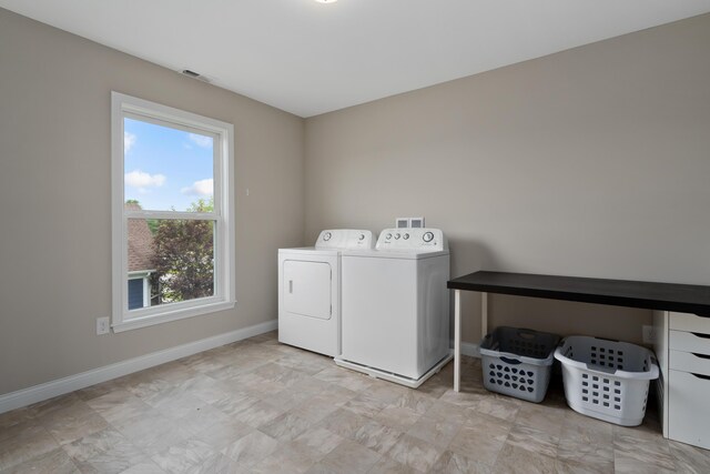 3669 Audubon Ave, Hilliard, OH 43026 - washroom with washing machine and clothes dryer and baseboards