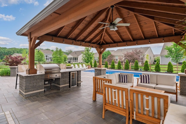 3669 Audubon Ave, Hilliard, OH 43026 - view of patio featuring a gazebo, outdoor lounge area, an outdoor pool, ceiling fan, and a residential view
