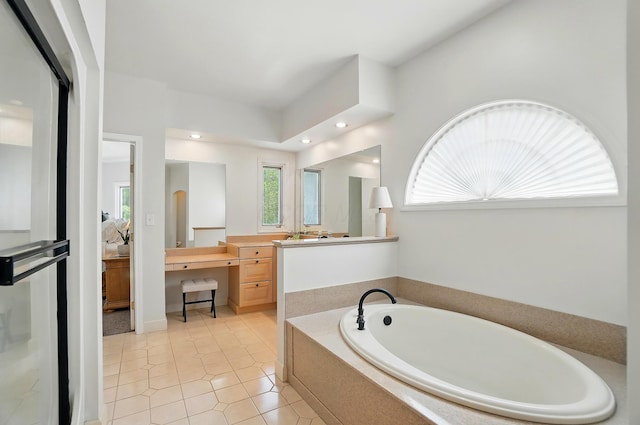 9146 Shawnee Trl, Powell, OH 43065 - bathroom with a bath, vanity, tile patterned floors, and recessed lighting