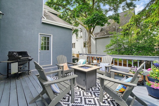 9146 Shawnee Trl, Powell, OH 43065 - deck with an outdoor fire pit and a grill