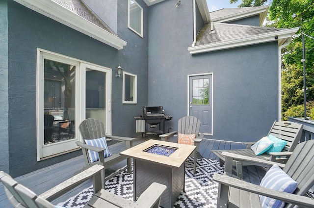 9146 Shawnee Trl, Powell, OH 43065 - deck featuring an outdoor fire pit and area for grilling