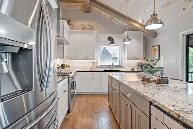 7326 State Route 19 Unit 2, Lots 27-30, Mount Gilead, OH 43338 - kitchen featuring appliances with stainless steel finishes, wooden ceiling, tasteful backsplash, light wood finished floors, and pendant lighting